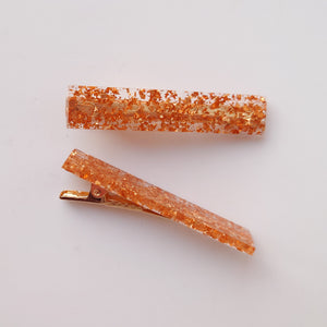 Duo of Clear with a Golden Fleck Resin Hair Clips